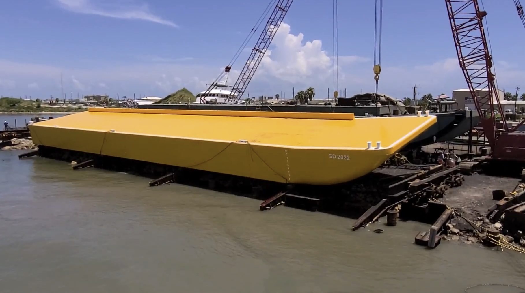 Barge GD 2022 being lowered by crane at the shipyard