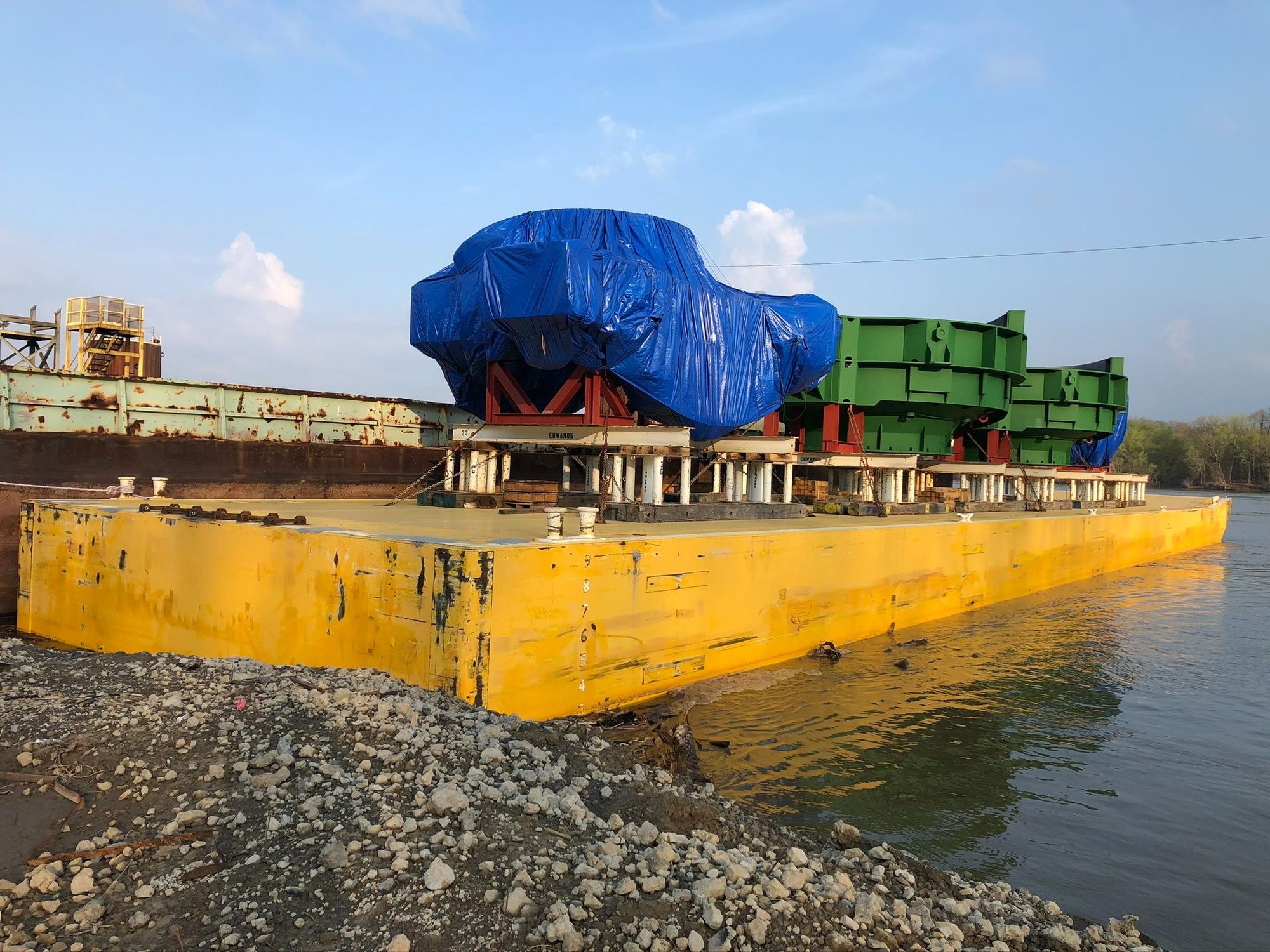 Daulton barge carrying project cargo at sunset