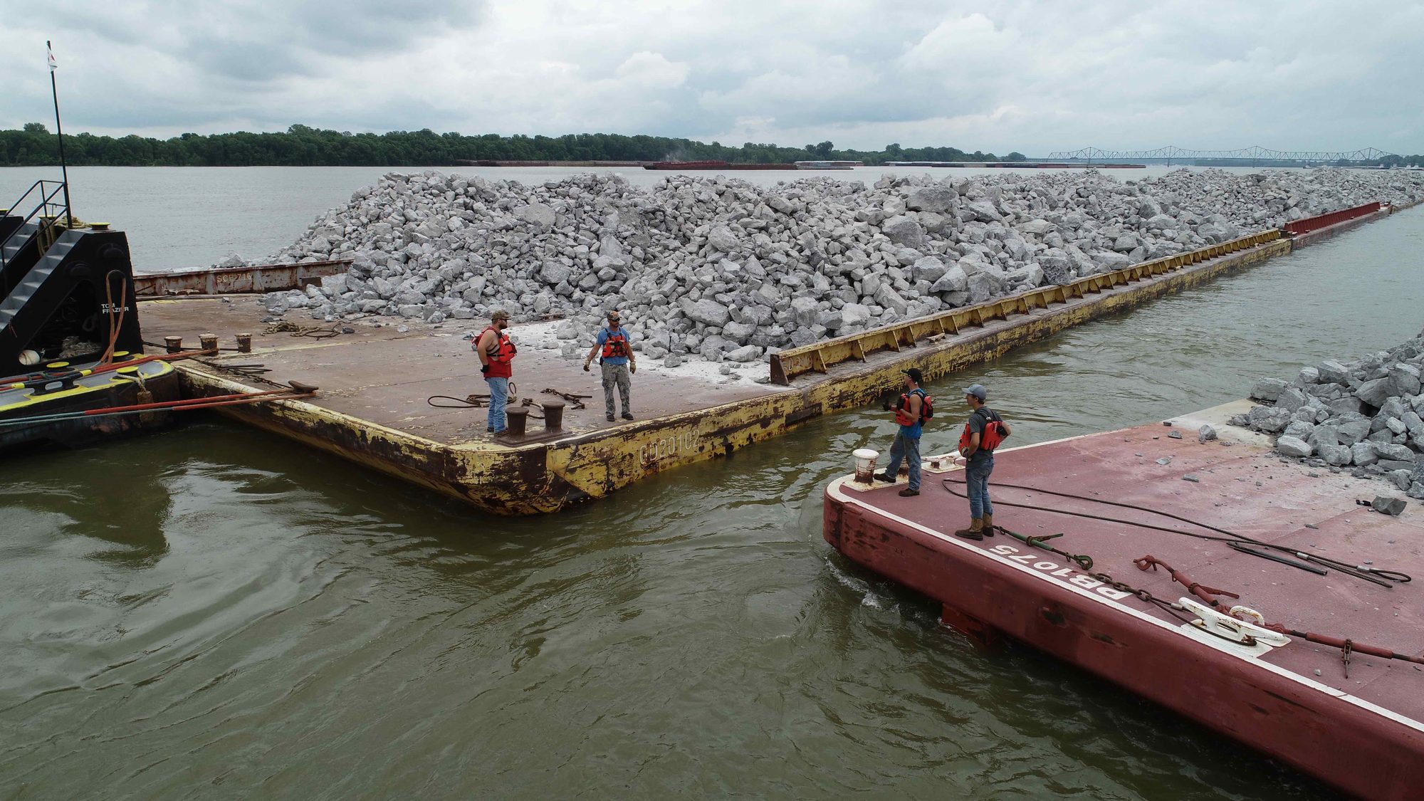 Crew working on Daulton barges